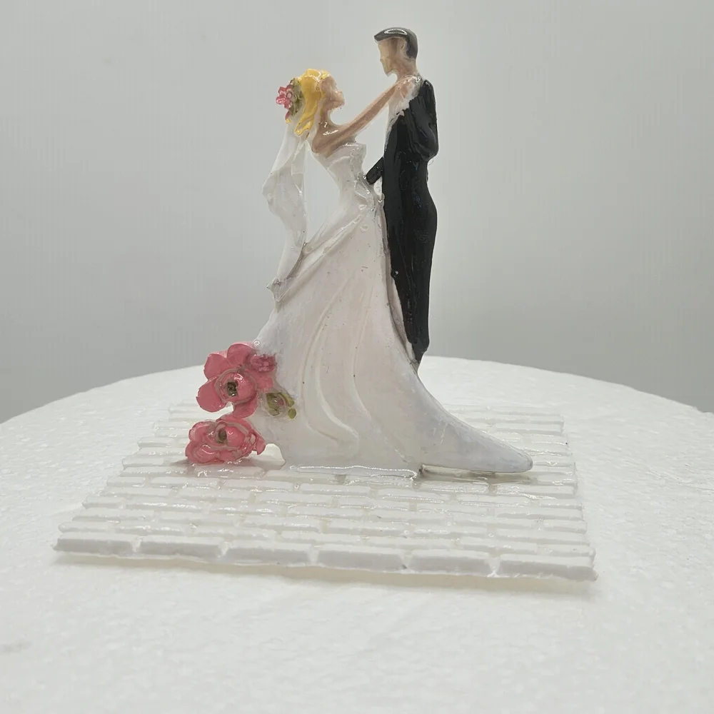 Romantic Bride and Groom Cake Topper with Pink and Black Details